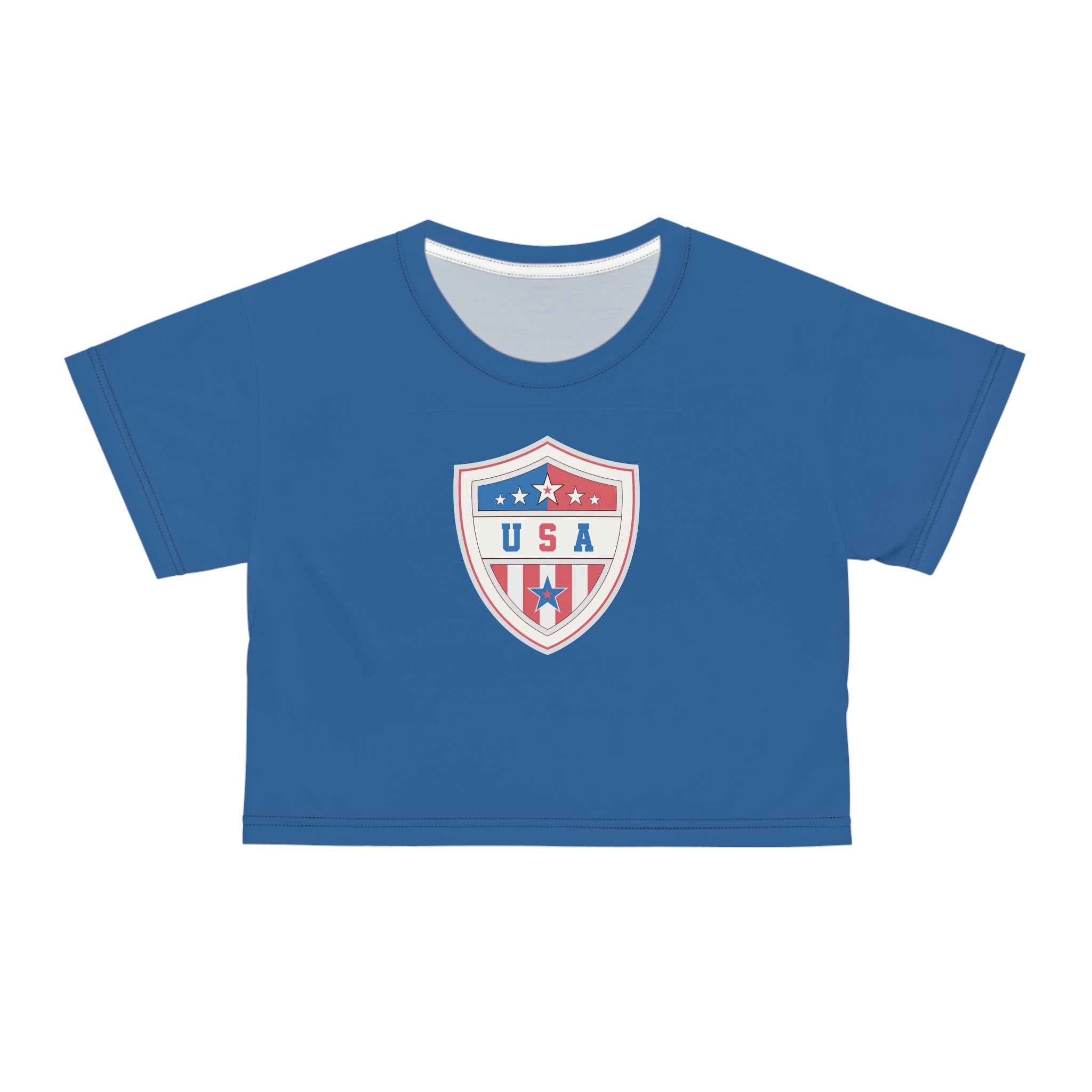 A royal blue short-sleeve crop top t-shirt featuring a USA shield crest graphic on the chest, displayed against a solid white background.