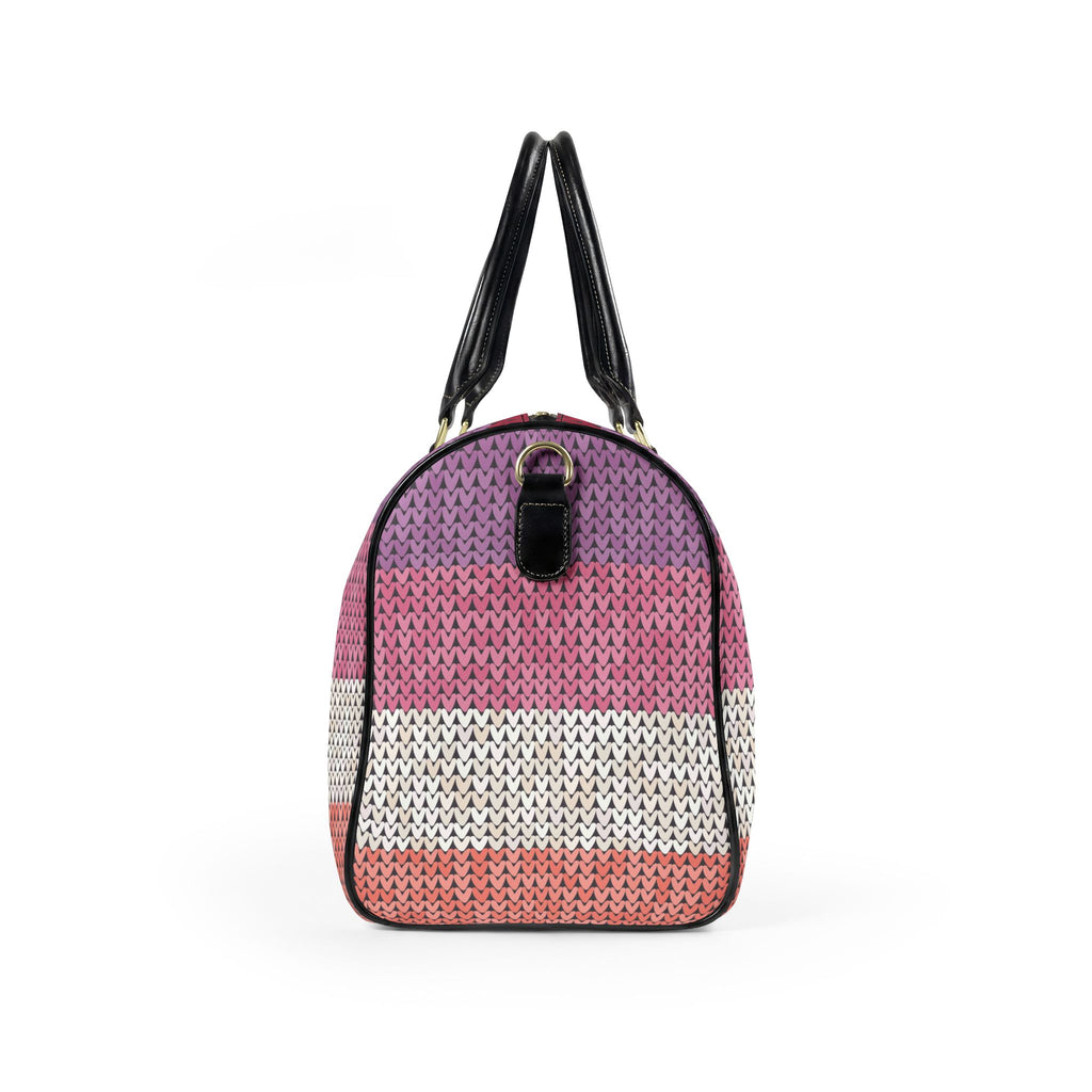 A dome-shaped woven handbag with horizontal stripes in purple, pink, white, and coral, featuring black leather handles and trim on a white background.