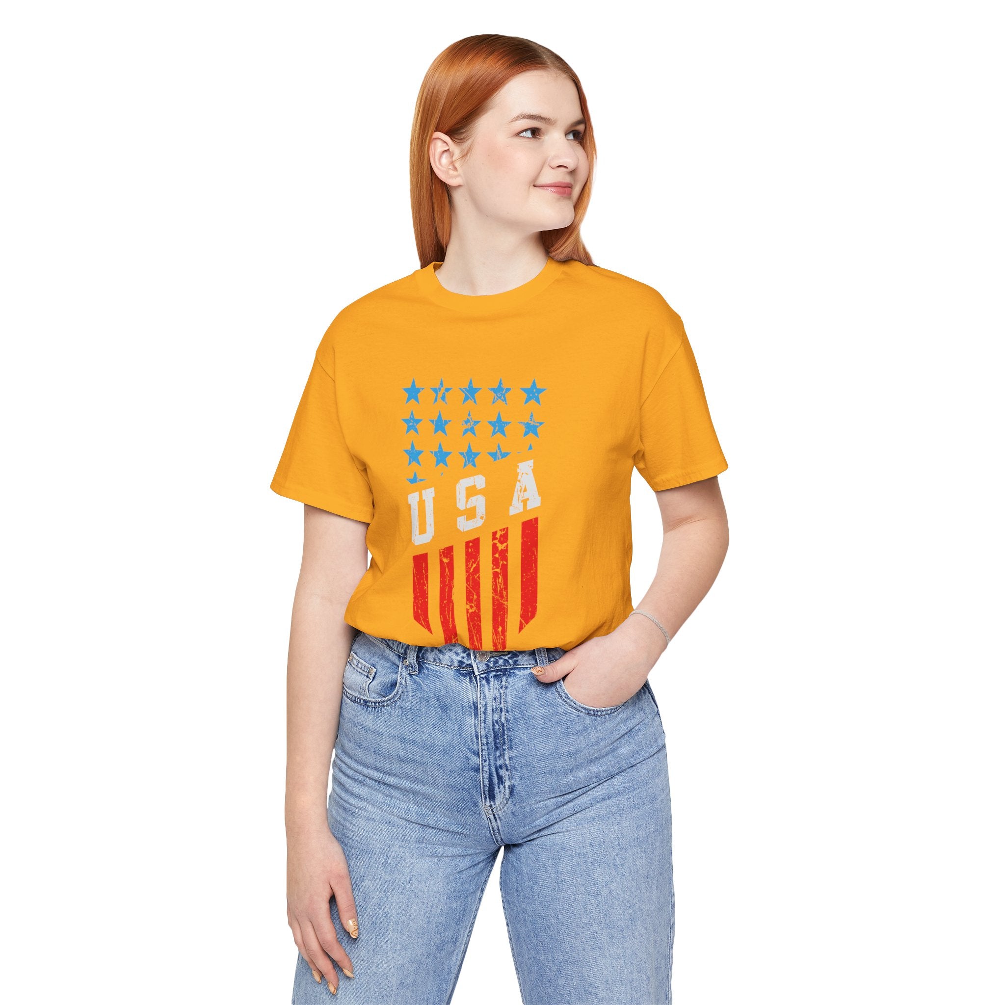 Person wearing a yellow t-shirt with 'USA' design on a white background