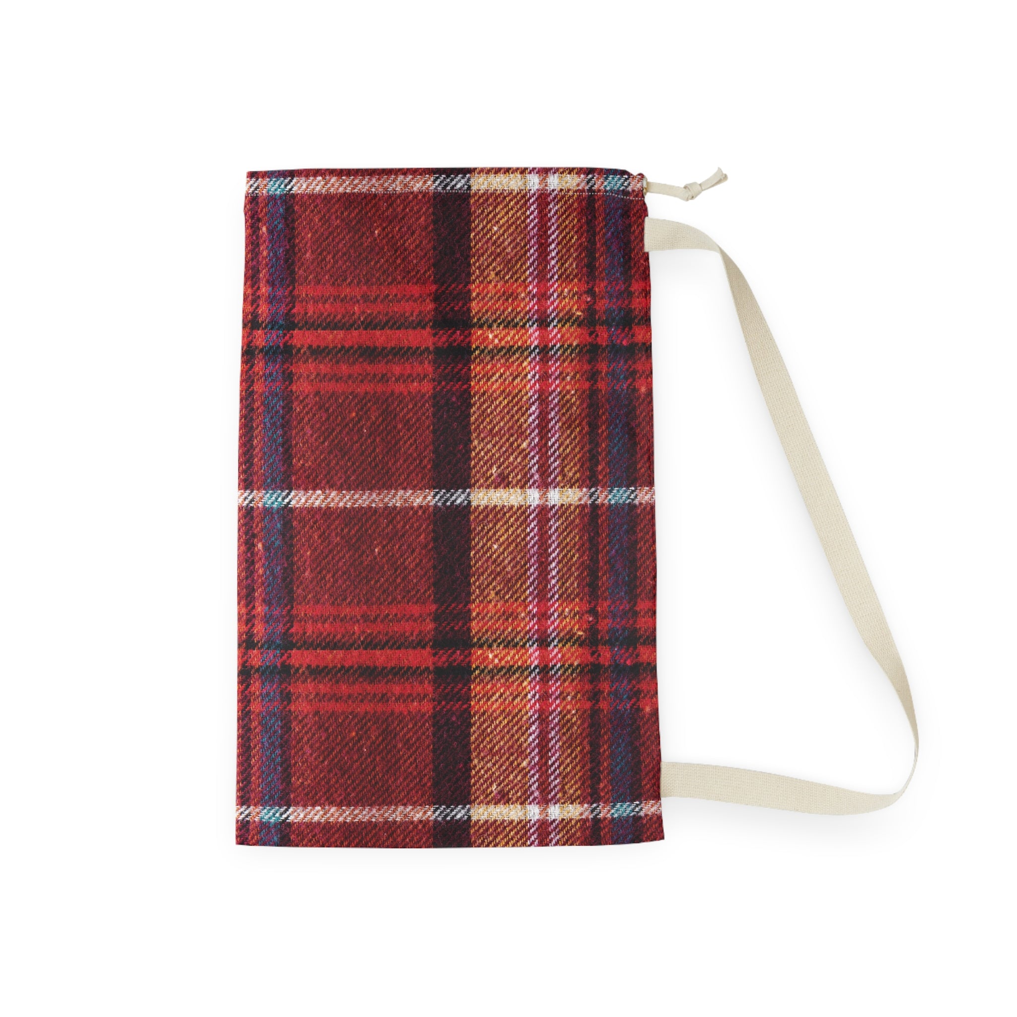 A red and brown plaid fabric pouch with a cream-colored strap, shown against a plain white background.