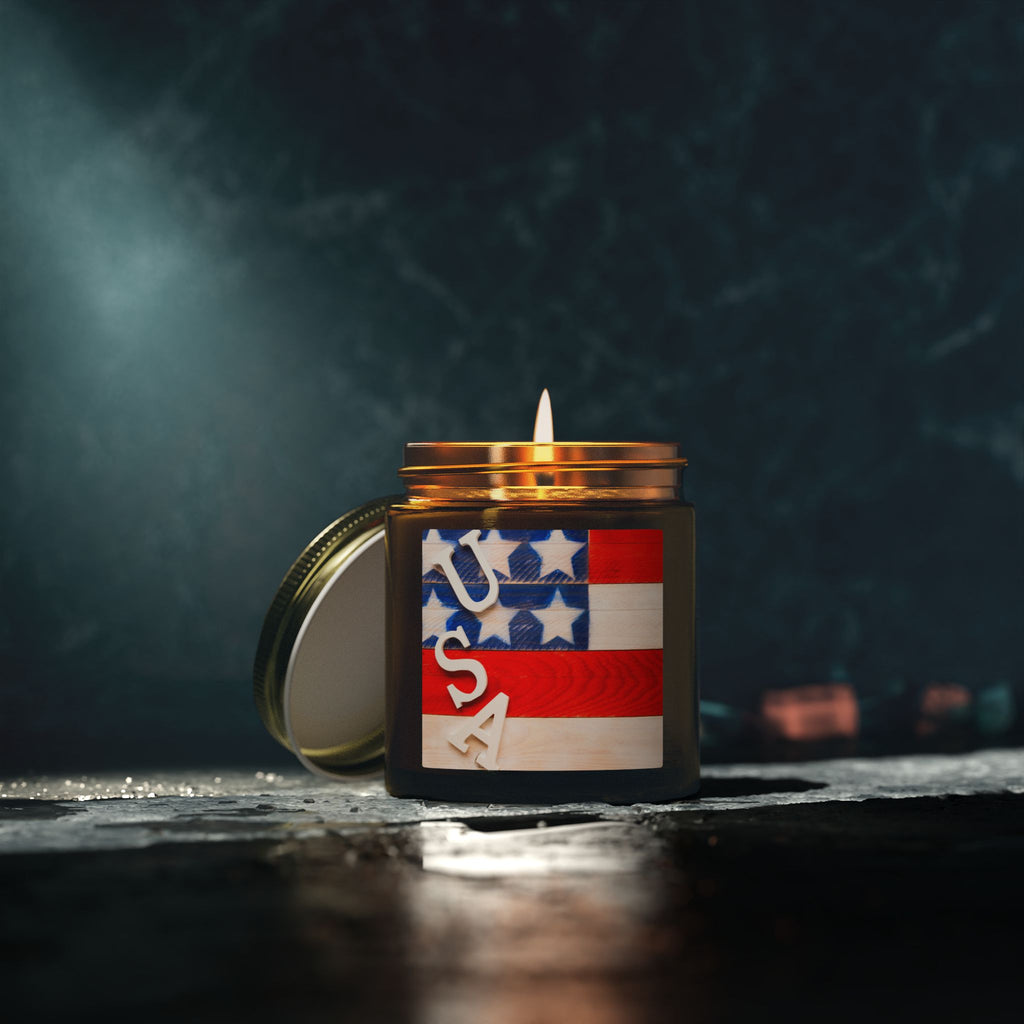 Candle in a jar with an American flag design on a dark background