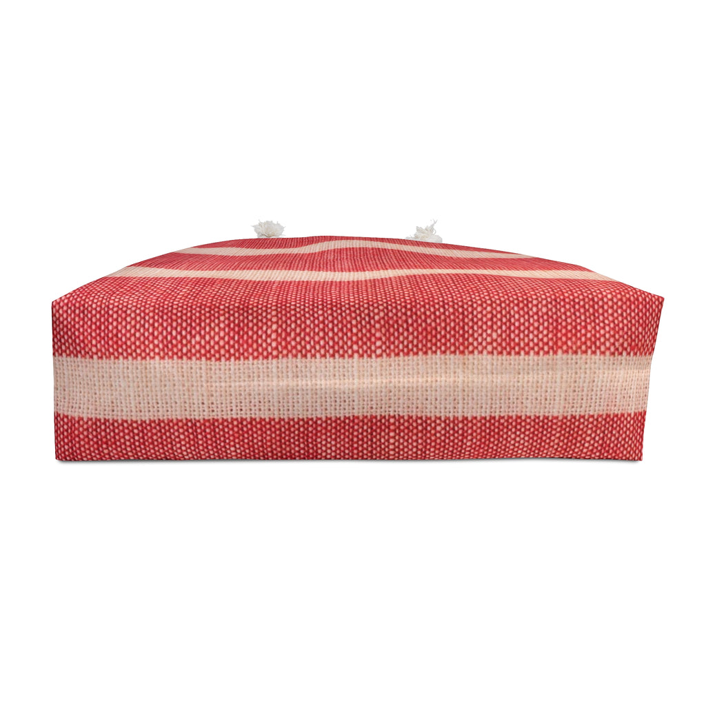 A rectangular outdoor pouf cushion with a red and beige woven striped pattern, shown against a plain white background.