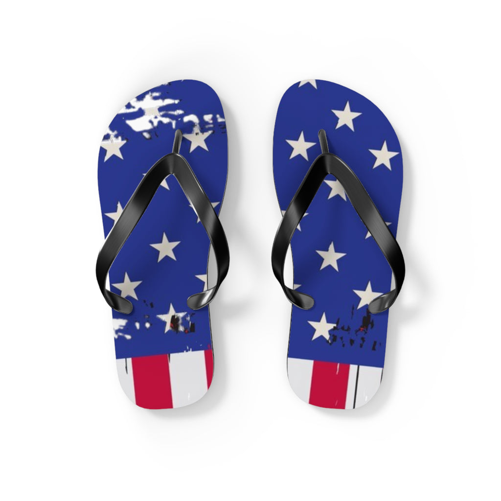 A pair of flip-flop sandals with a distressed American flag design, featuring blue straps with white stars and red and white stripes at the toe, shown on a white background.