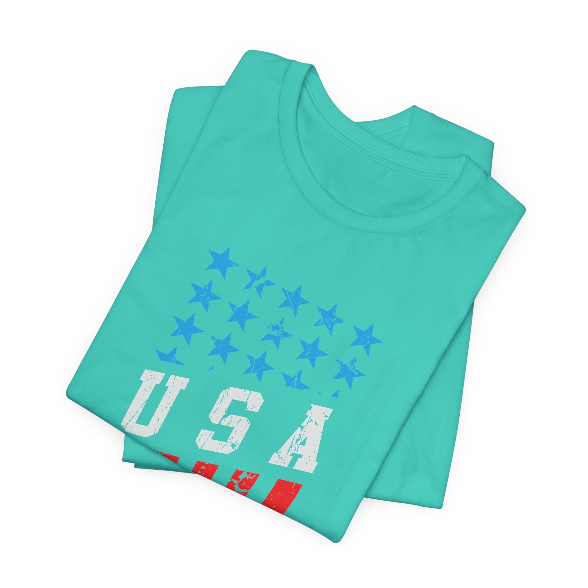 Folded teal t-shirt with star pattern and 'USA' text on a white background