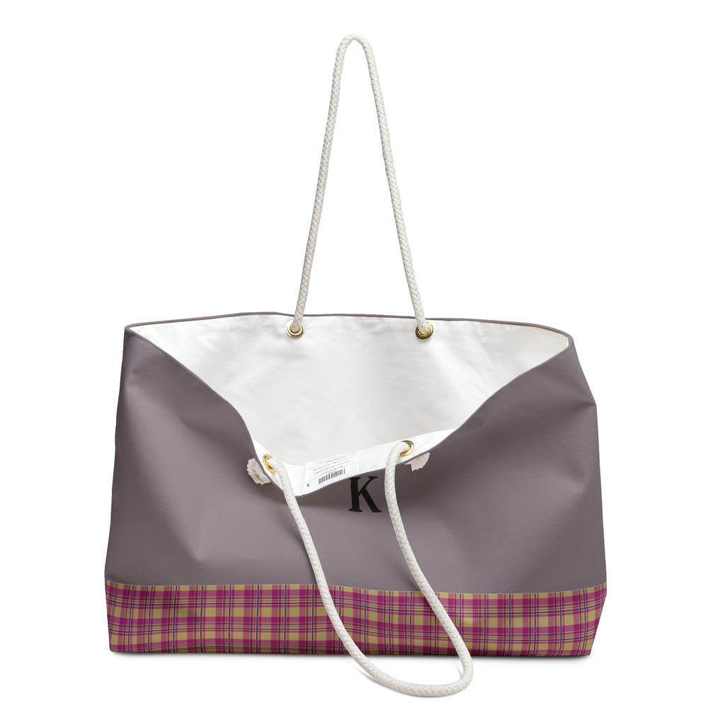 Tote bag with geometric pattern and white drawstring on a white background