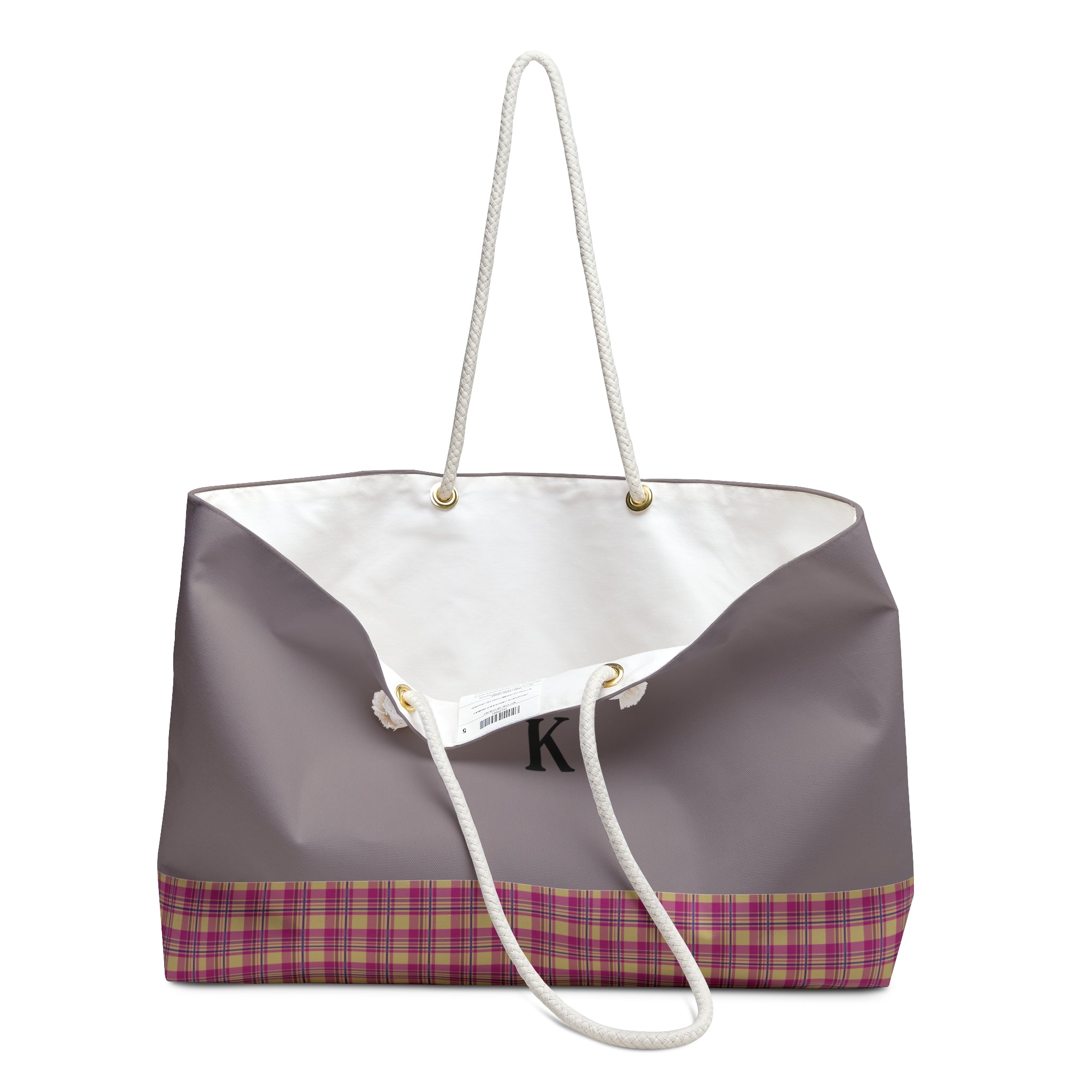 Tote bag with geometric pattern and white drawstring on a white background
