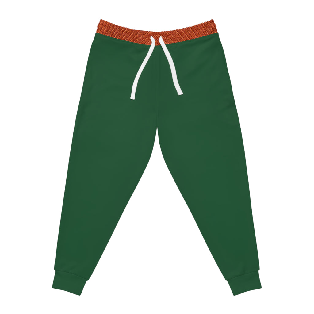 Green jogger pants with a textured orange-brown elastic waistband, white drawstrings, and ribbed ankle cuffs, shown flat on a white background.