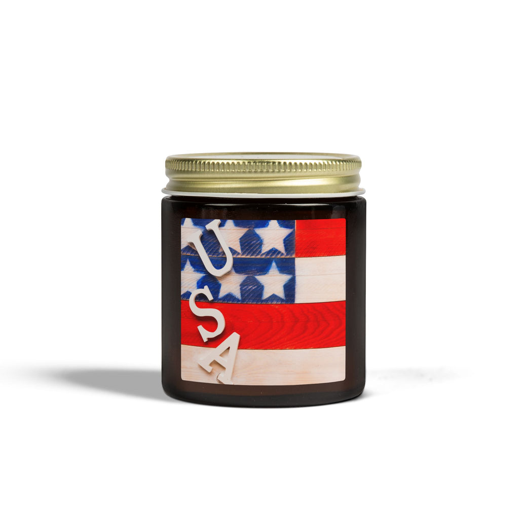 Candle jar with American flag design and gold lid on a white background