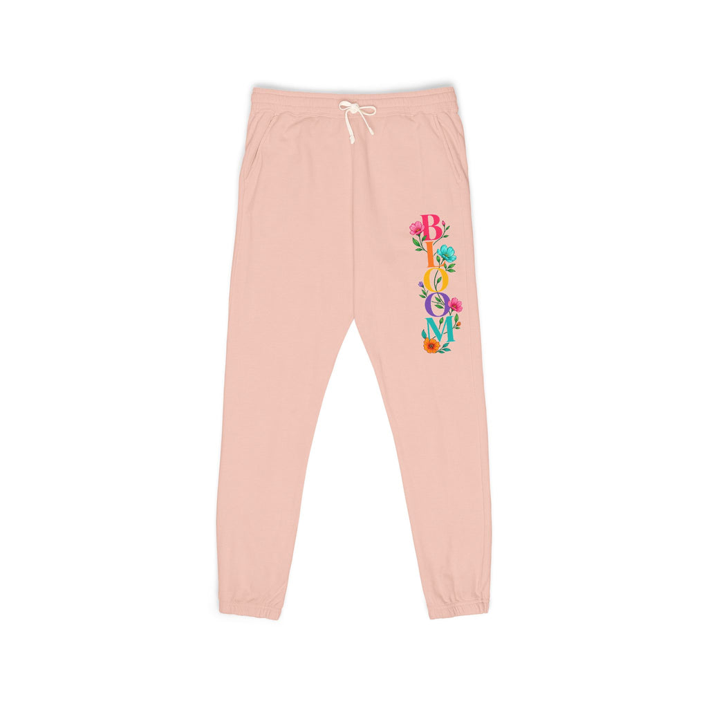 Pink sweatpants with colorful 'Beloved' design on a white background