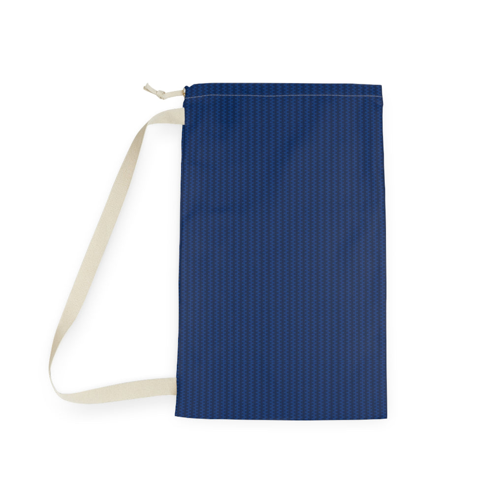 A navy blue drawstring pouch with a subtle textured pattern, featuring a cream-colored strap and zipper pull, shown on a plain white background.