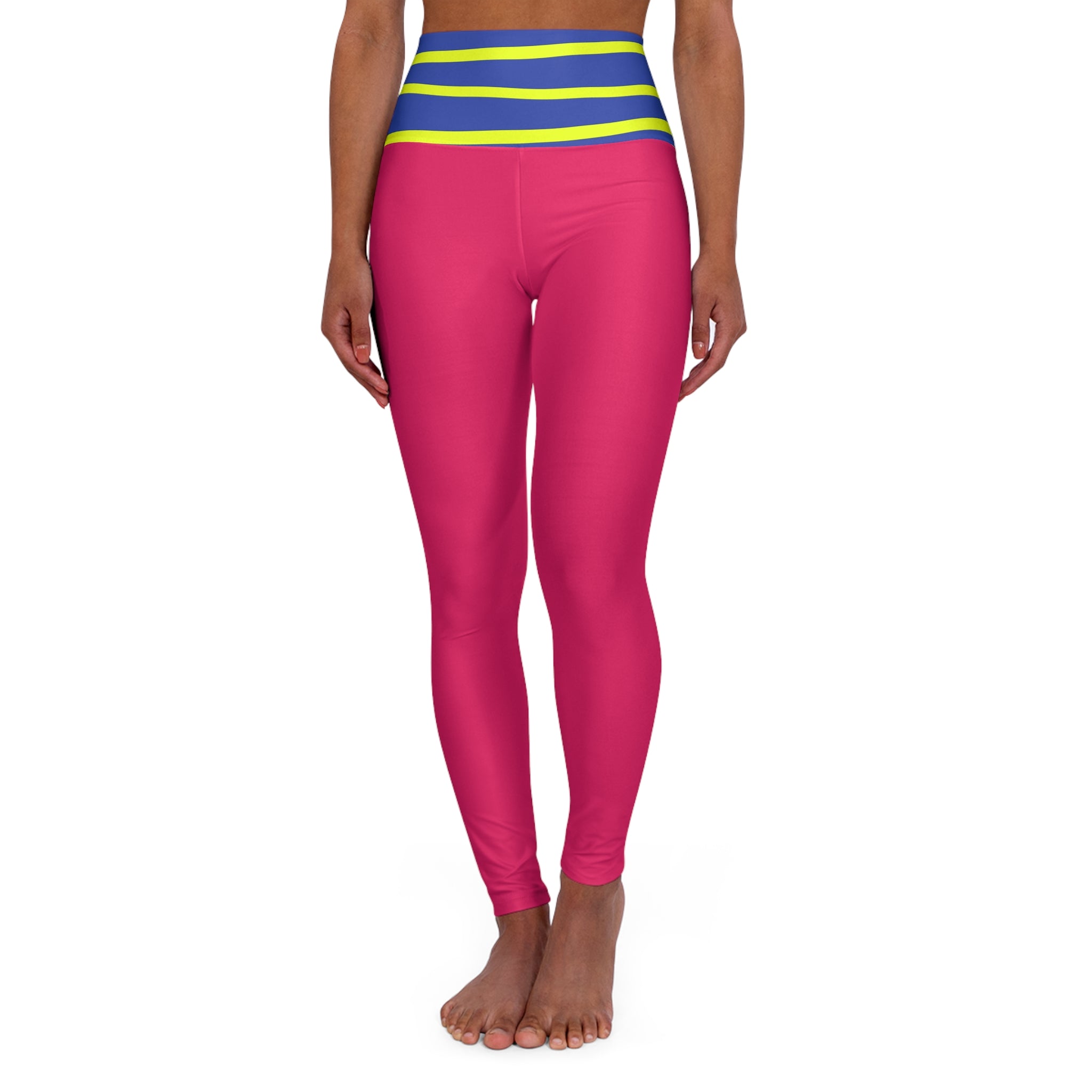 A model wearing bright pink leggings with a blue and neon yellow striped waistband, shown from the waist down on a white background.