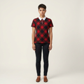 Person wearing a red and black checkered shirt with a white collar on a beige background