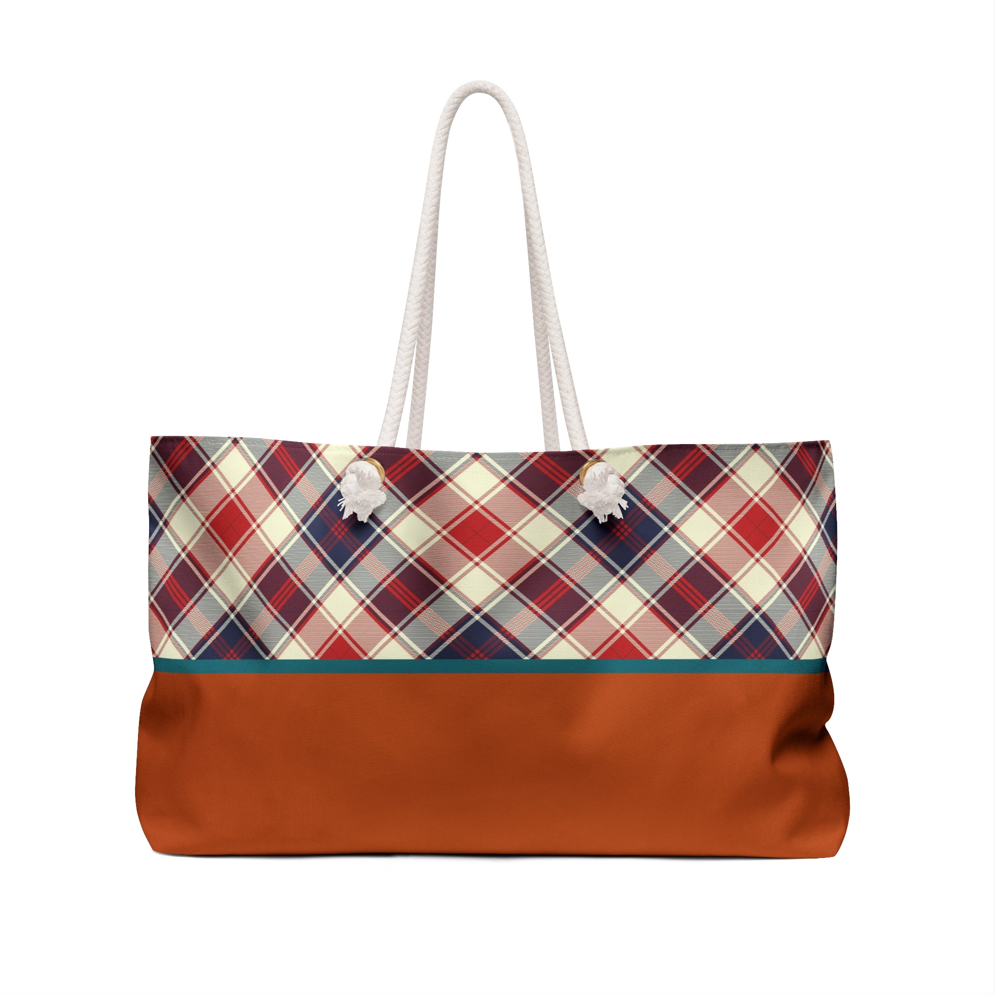 A tote bag with a rust orange bottom half and a red, navy, and cream plaid patterned top half, featuring white rope handles.