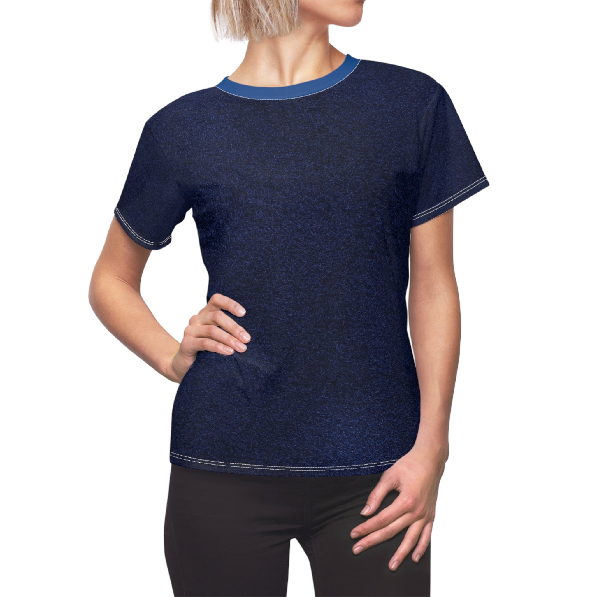 A woman wearing a dark navy blue short-sleeve t-shirt with contrasting light blue trim on the crew neck and sleeve cuffs, paired with black pants, shown against a plain white background.