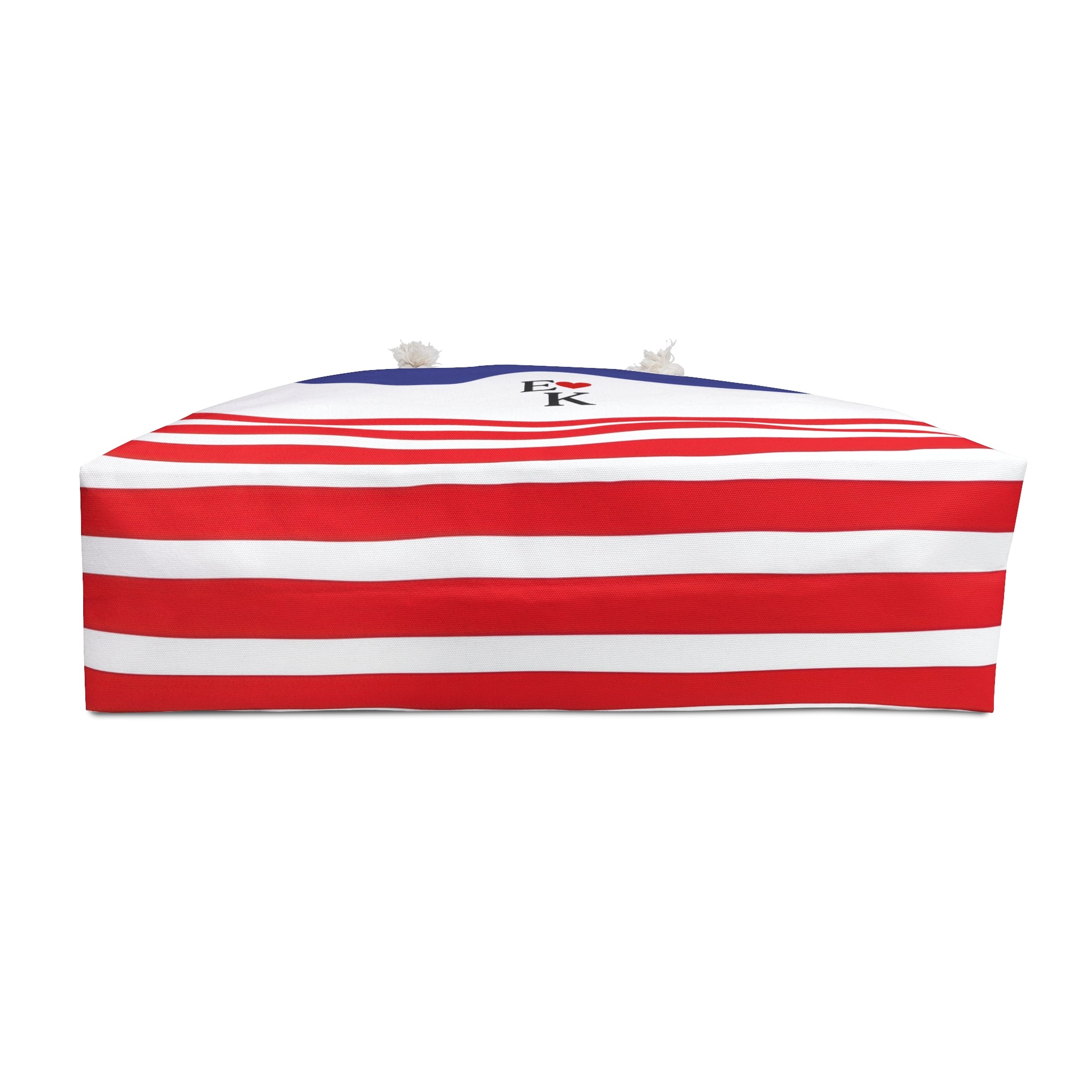 A rectangular pet bed with a bold red and white horizontal stripe pattern, featuring a blue top panel with a small black and white logo, shown on a plain white background.