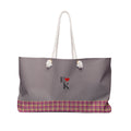 Tote bag with black polka dots on a pink background