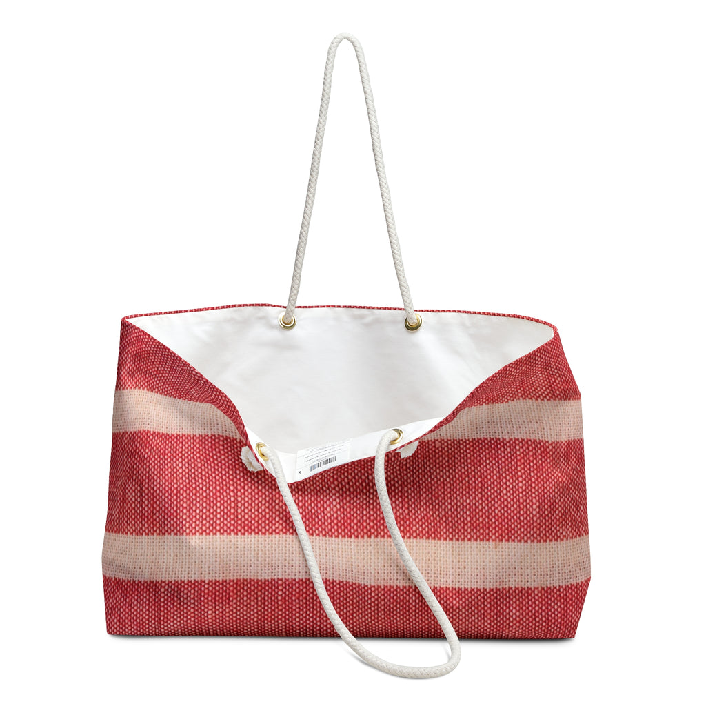 Red and white tote bag with rope handles on a white background