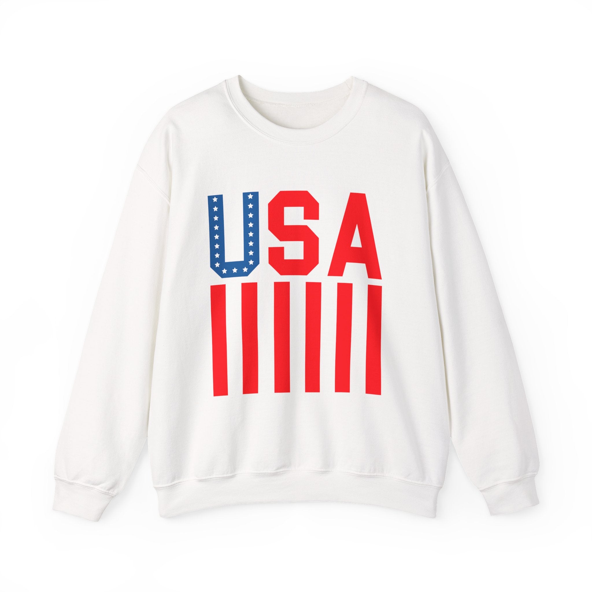 An off-white crewneck sweatshirt featuring a bold 'USA' graphic on the chest, where the letter 'U' is styled as a blue star-spangled flag and 'S' and 'A' are solid red, with five red vertical stripes below.