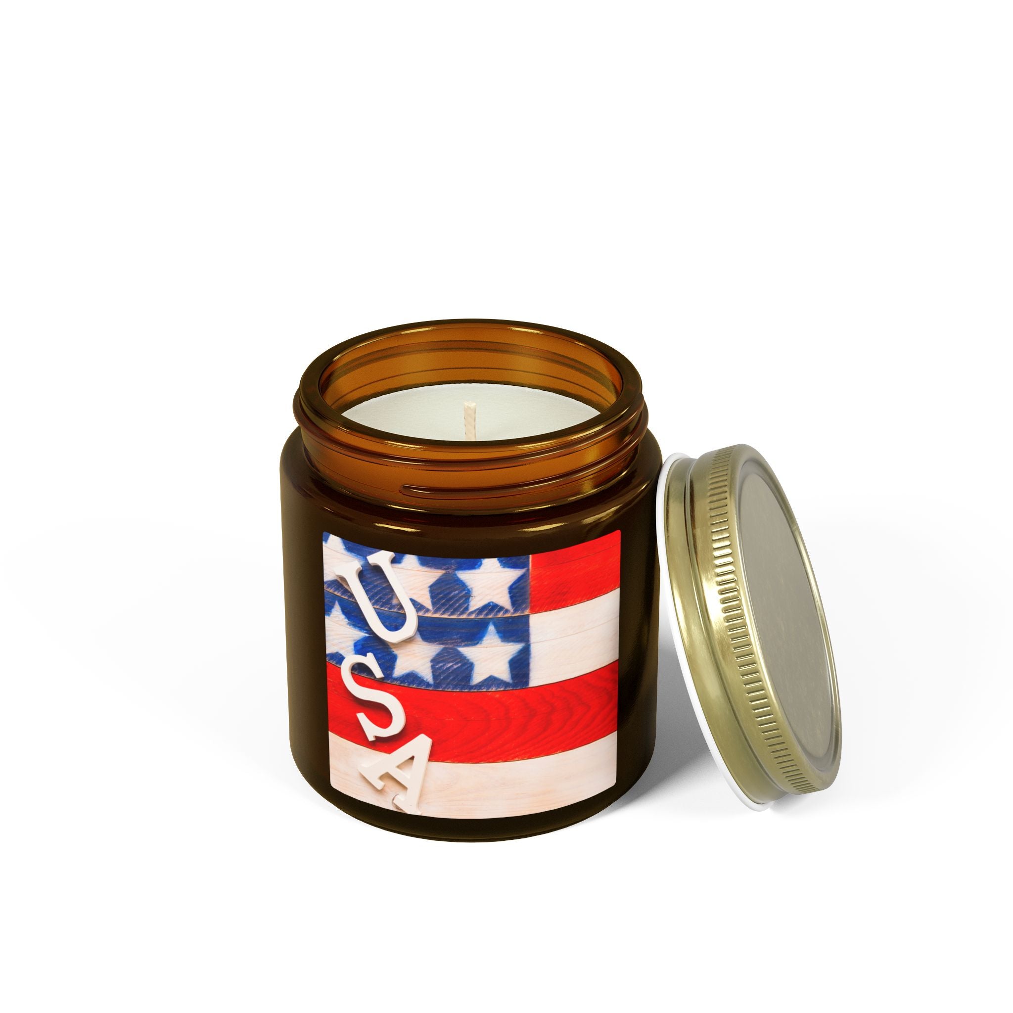Candle in an amber jar with a decorative label featuring stars and stripes on a white background