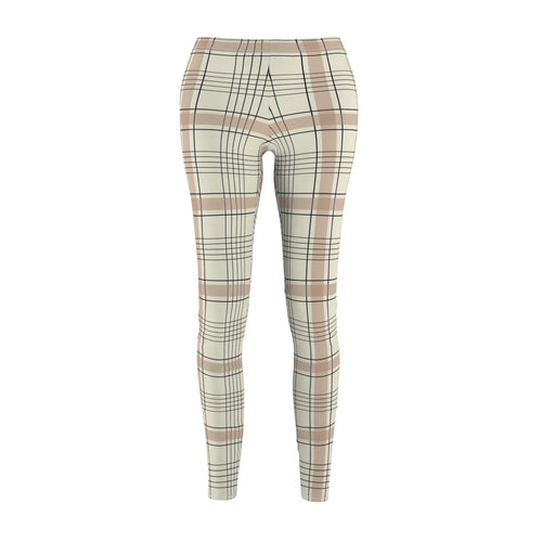 Plaid leggings in a cream, beige, and dusty pink colorway with thin black and white intersecting lines, shown on a plain white background.