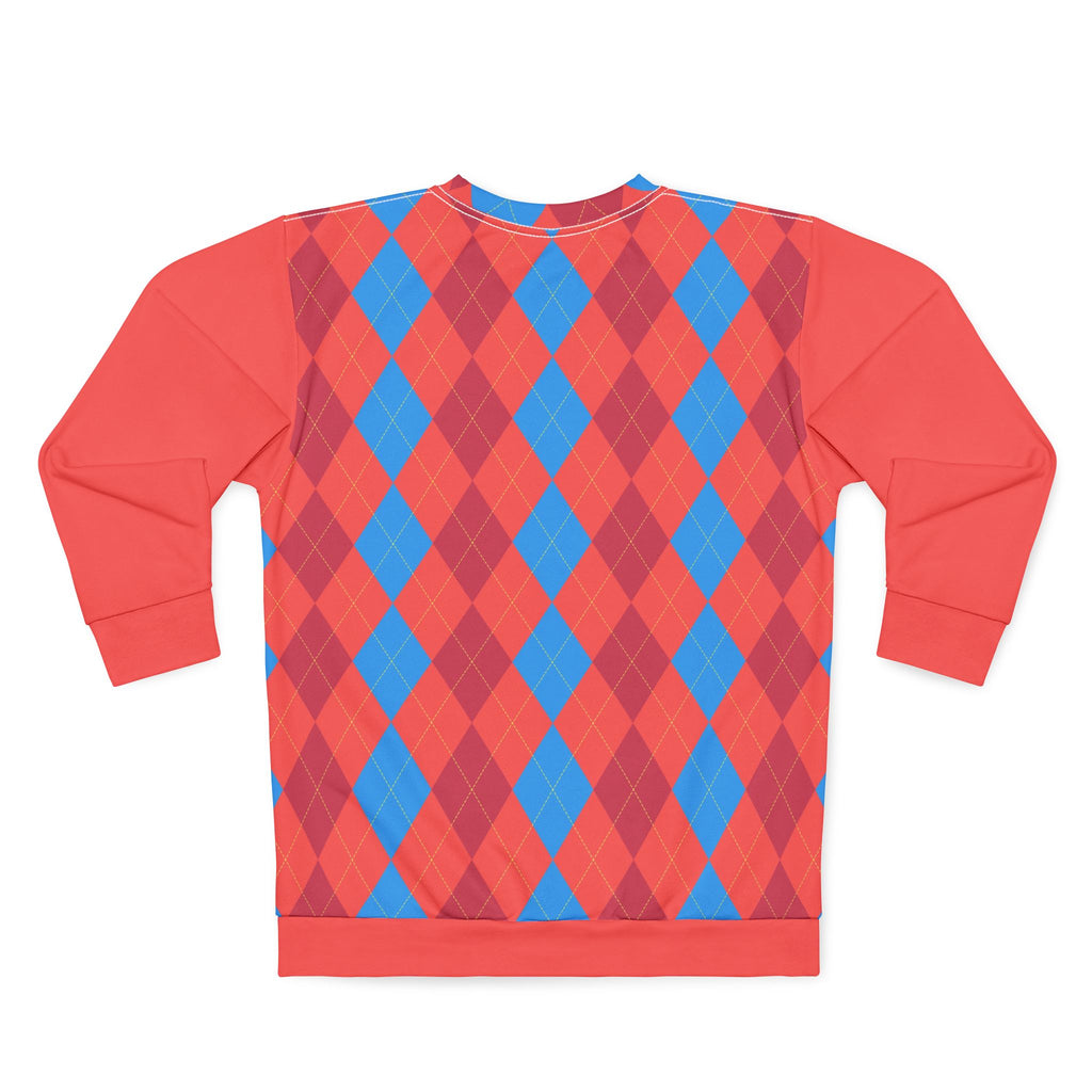 A long-sleeve crewneck sweatshirt shown flat against a white background, featuring a vibrant argyle pattern on the front with alternating red, magenta, and blue diamonds, and solid coral-red sleeves and hem.