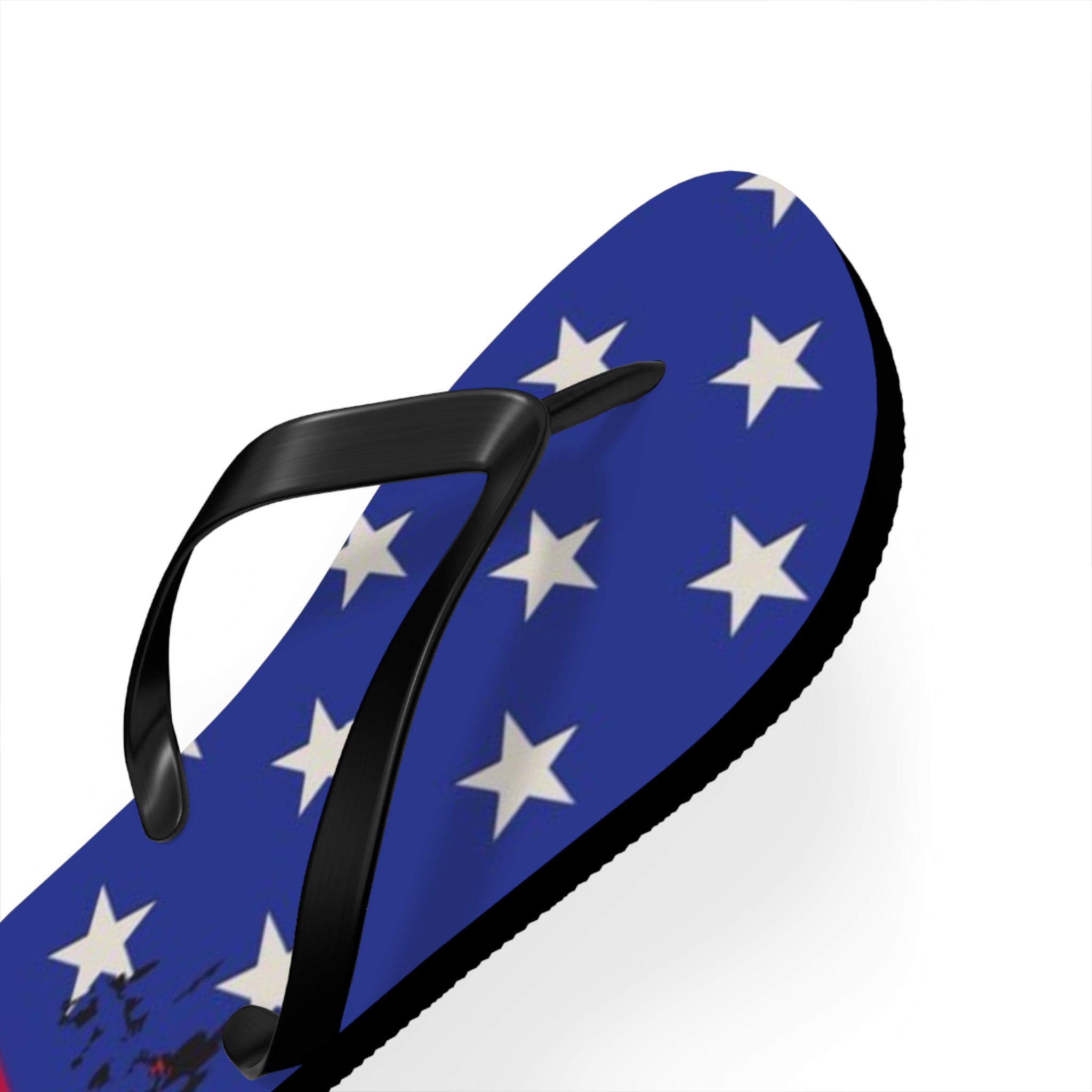 A single flip-flop sandal shown on a plain white background. The footbed is blue with a pattern of white stars, and the thong strap is black.