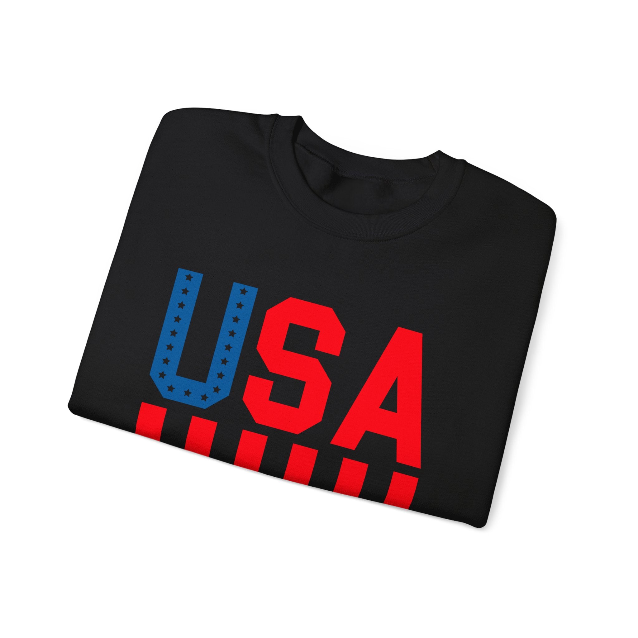 A folded black t-shirt with a patriotic 'USA' graphic on the front, featuring a blue star-patterned 'U' and red 'S' and 'A' with red stripes underneath, set against a plain white background.