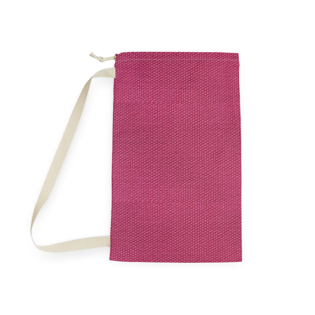 A rectangular pink woven drawstring bag with a cream-colored strap, shown flat against a white background.