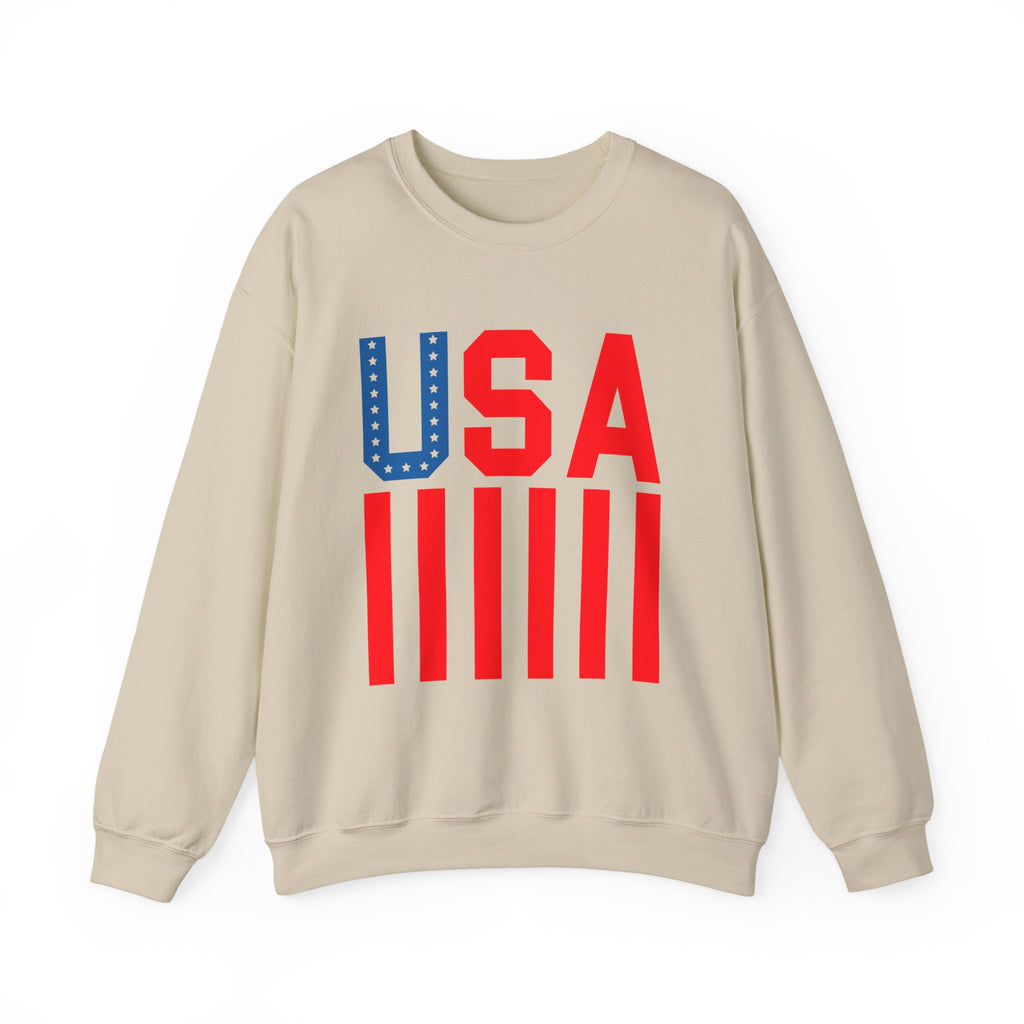 A beige crewneck sweatshirt featuring a bold graphic print on the front with the letters 'USA' in red and blue, styled like the American flag.