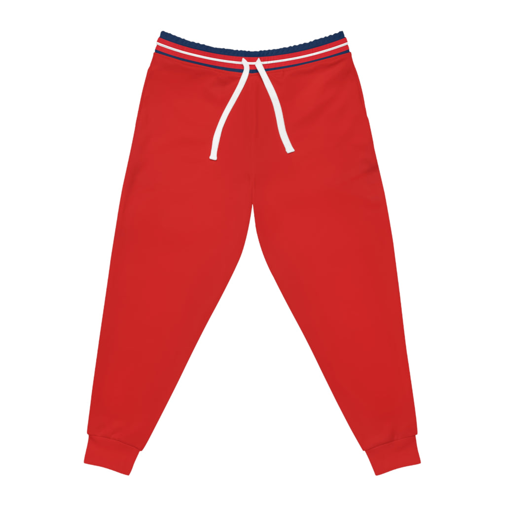 Red jogger sweatpants with a navy and red striped elastic waistband, white drawstrings, and ribbed ankle cuffs, shown flat on a white background.