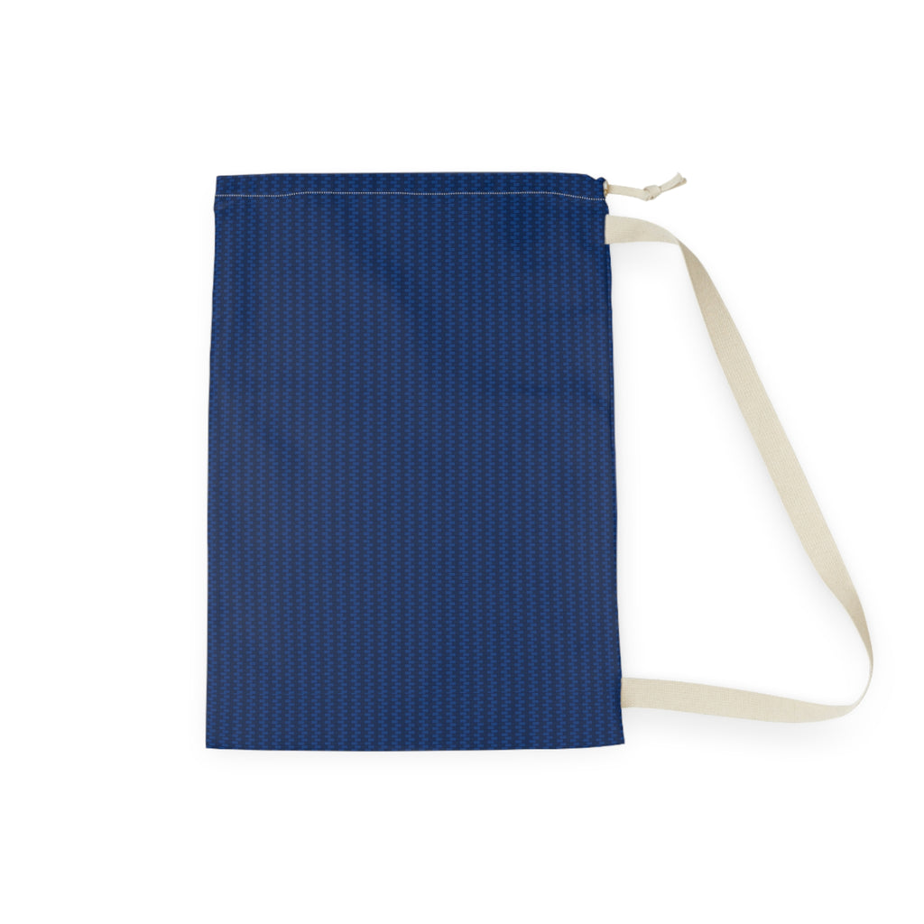 A navy blue zippered pouch with a subtle geometric pattern, featuring a cream-colored fabric strap and zipper pull, shown on a plain white background.
