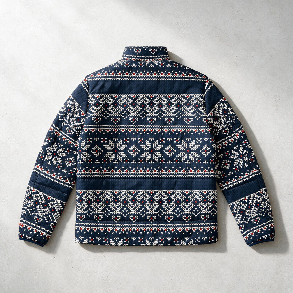 A navy blue quilted puffer jacket with a white and red Nordic/Fair Isle pattern, shown from the back against a light gray textured background.