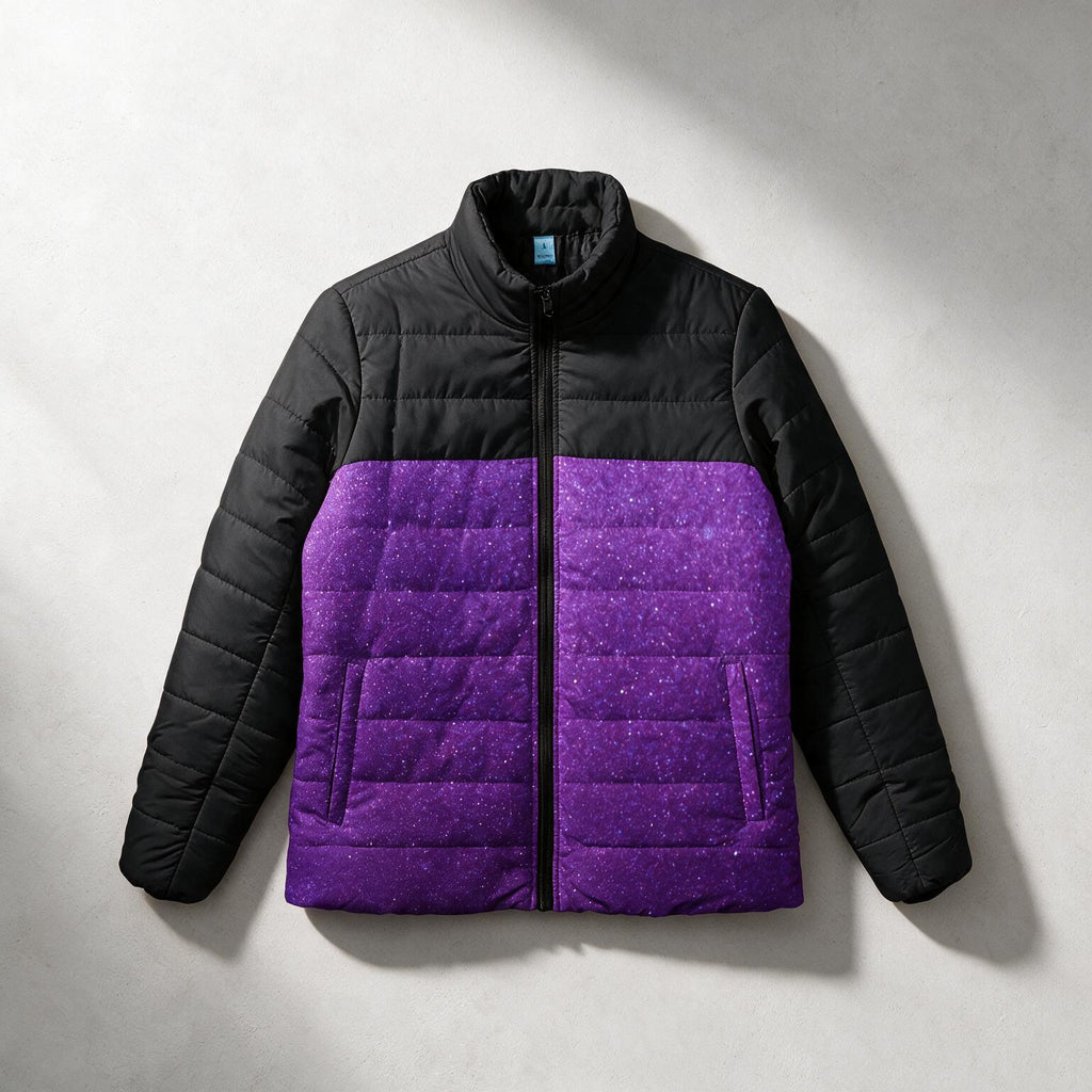 A quilted puffer jacket with a black upper section and sleeves, and a textured purple lower section, laid flat on a light gray background.