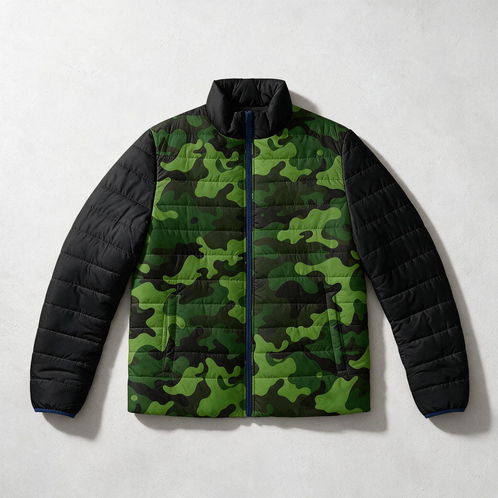 A quilted puffer jacket with a green and black camouflage pattern on the front and a solid black quilted sleeve design, shown flat on a light gray textured background.