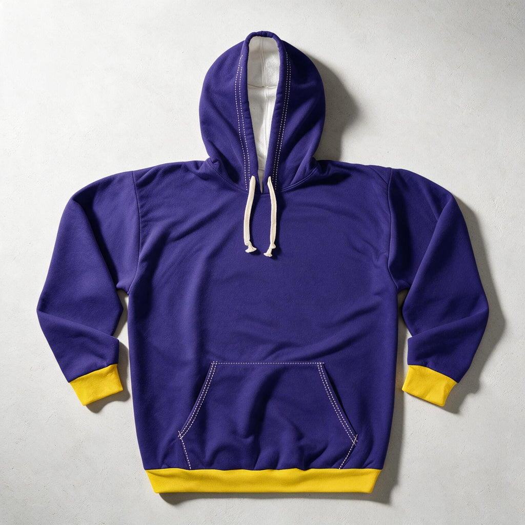 A purple pullover hoodie with yellow ribbed cuffs, hem, and pocket trim, featuring white drawstrings, laid flat on a light gray background.