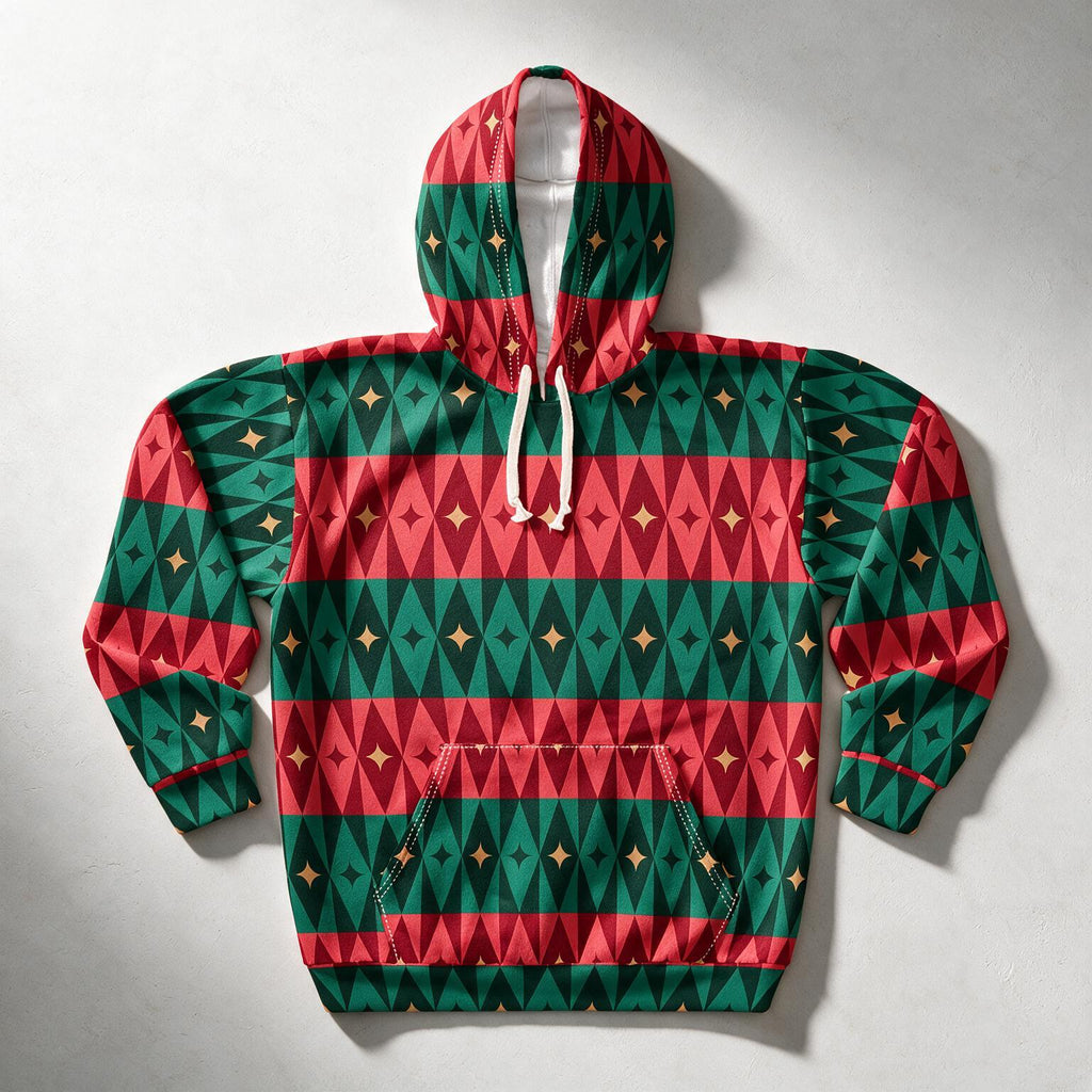 A long-sleeve pullover hoodie with a festive geometric pattern of red and green triangles, accented with small gold stars. The hoodie features white drawstrings and a front kangaroo pocket, laid flat on a light gray background.