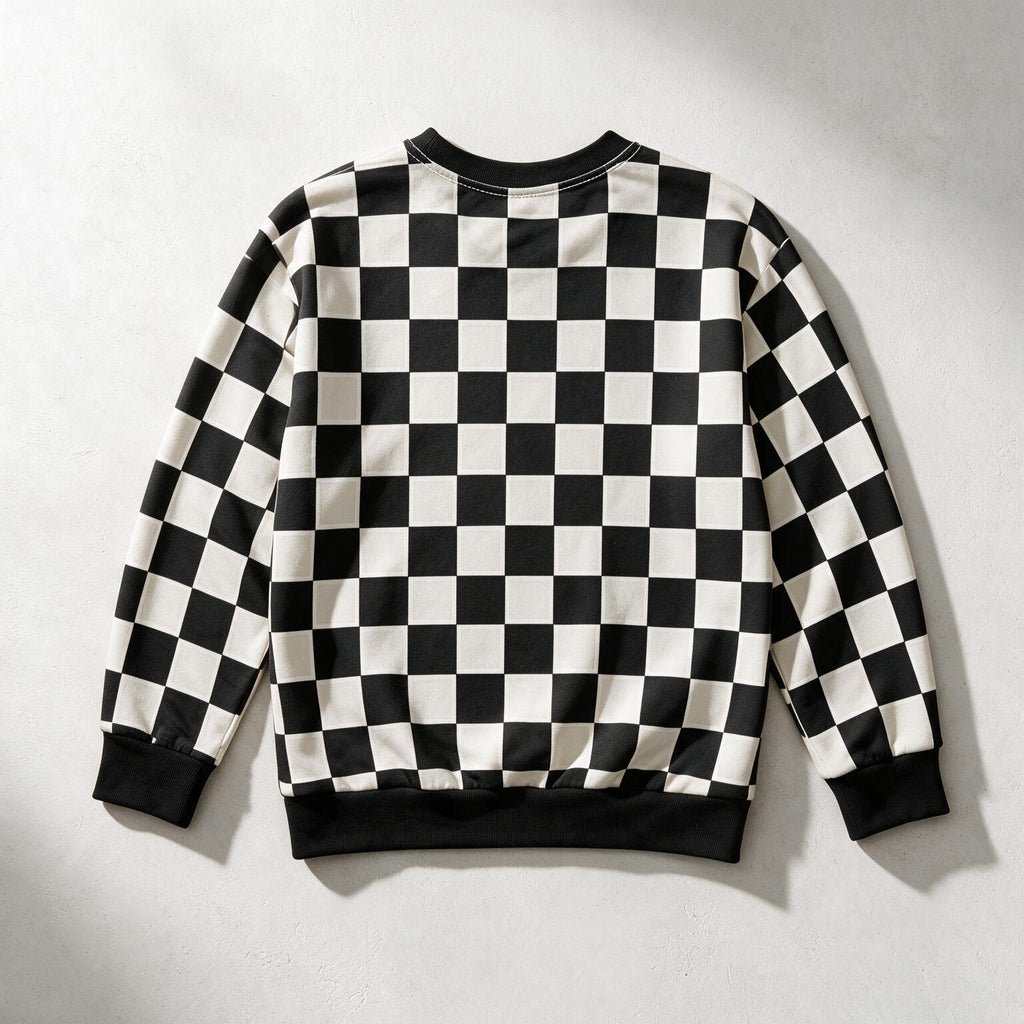 A black and white checkered long-sleeve sweatshirt shown from the back, laid flat on a light gray textured background.
