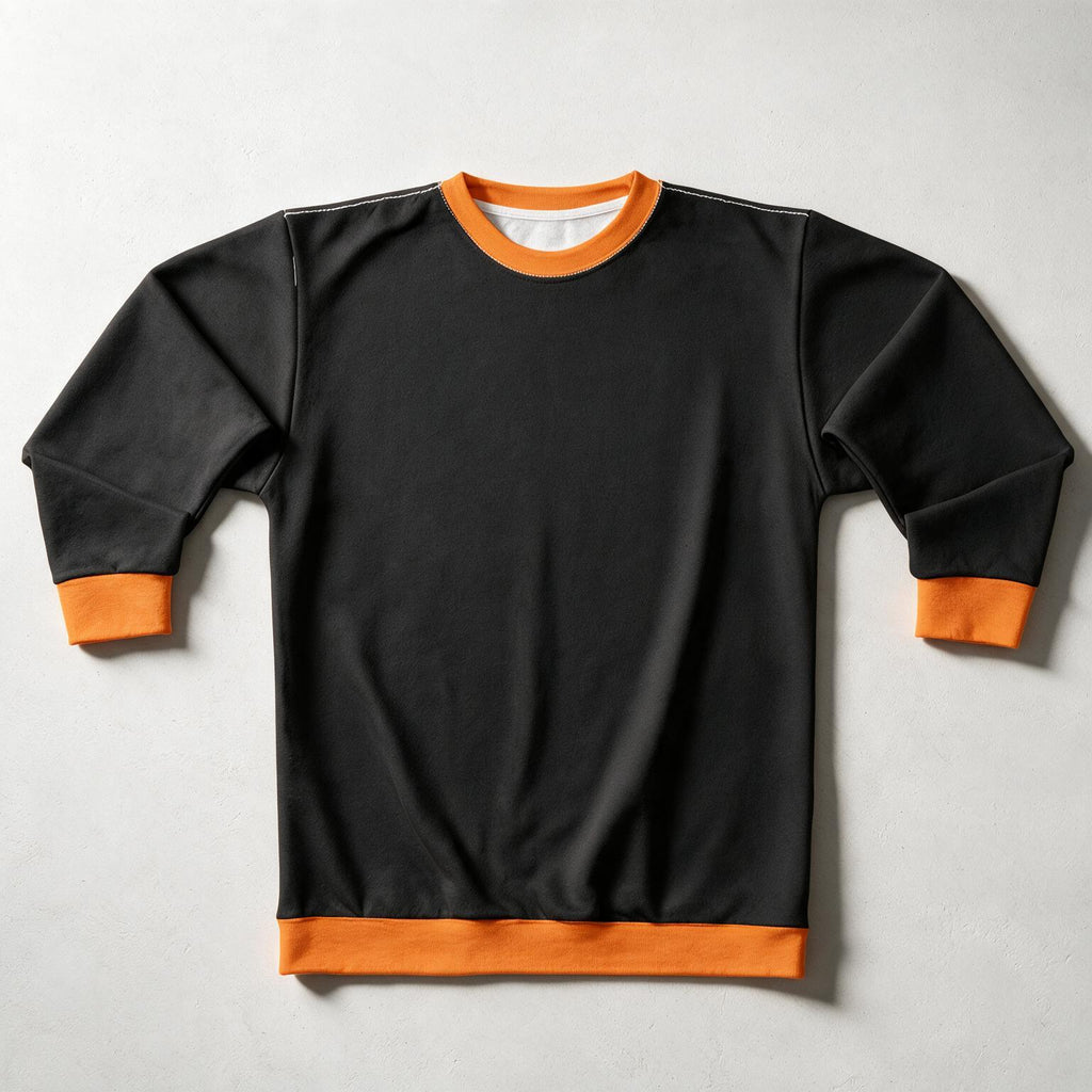A black long-sleeve crewneck sweatshirt with contrasting orange ribbed trim on the collar, cuffs, and hem, laid flat on a light gray background.